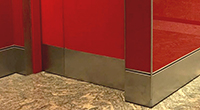 Stainless Steel Skirting & Kick Plate to Colour-backed Glass Wall